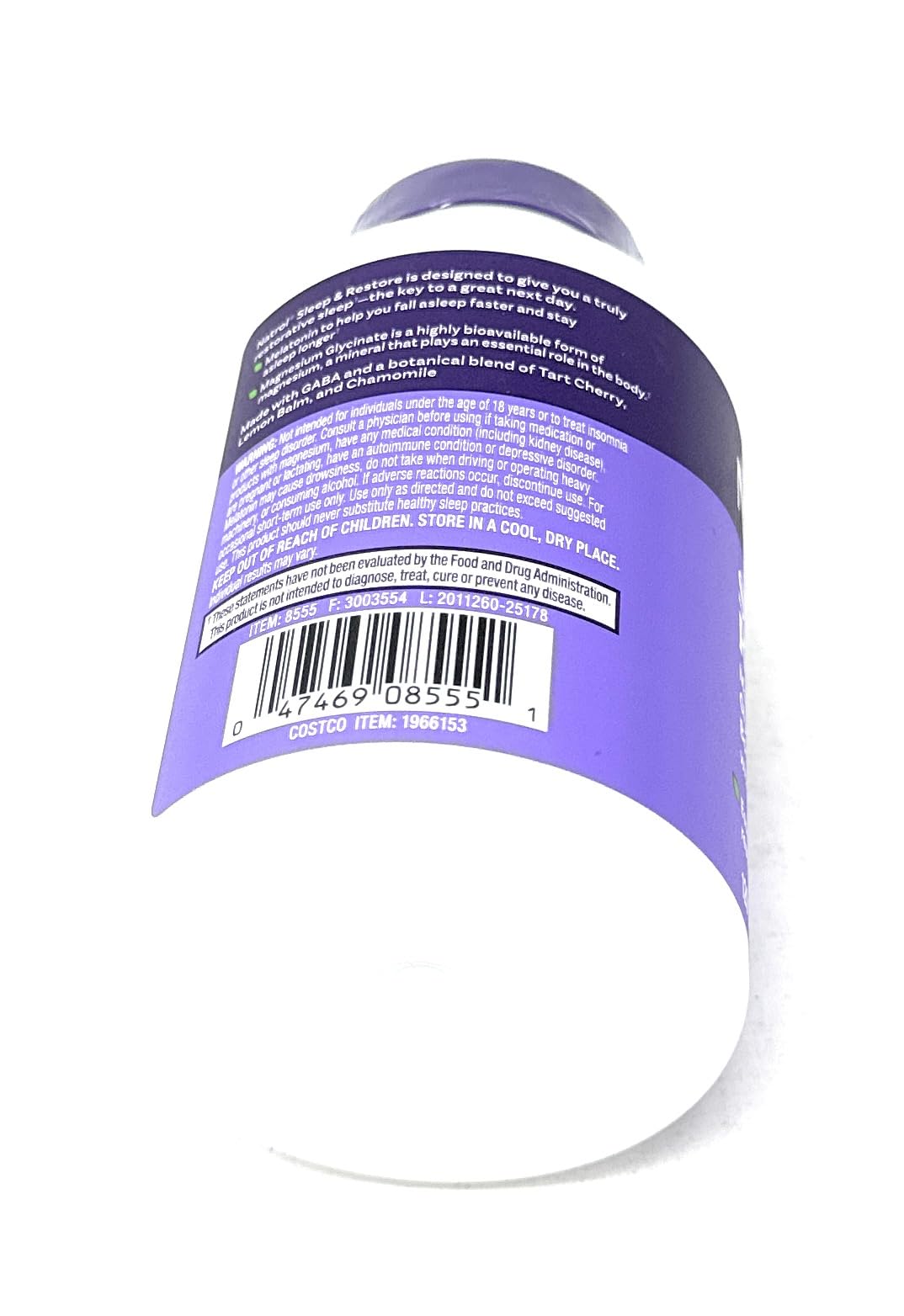 Natrol Sleep & Restore bottle in nightstand setup implies easy nightly routine