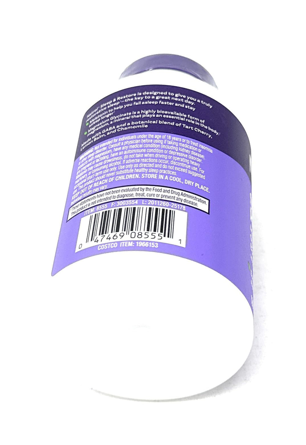Natrol Sleep & Restore bottle in nightstand setup implies easy nightly routine