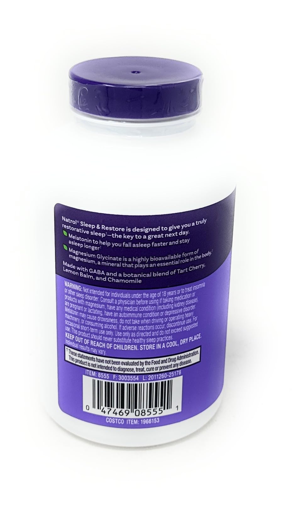 Close-up of Natrol Sleep & Restore capsules highlighting melatonin blend