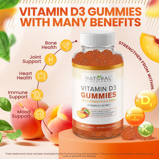 Natural BioScience sugar-free vitamin D3 K2 gummies close-up shows peach flavor and chewy texture.