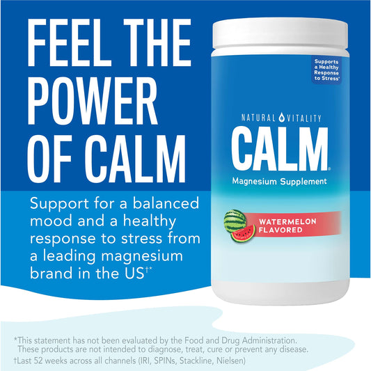 Scoop of Natural Vitality CALM powder next to the canister