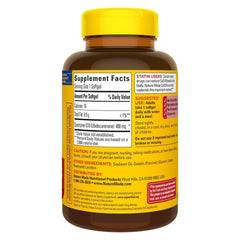 Nature Made CoQ10 softgels bottle back label shows 400 mg per softgel for daily use.