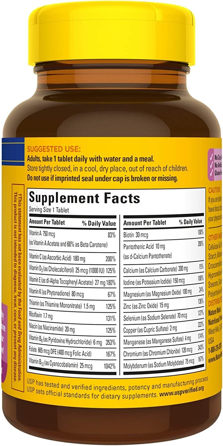 Nature Made Multi for Her 50+ bottle in hand suggests travel-friendly pills