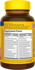 Nature Made Multi for Her 50+ bottle in hand suggests travel-friendly pills
