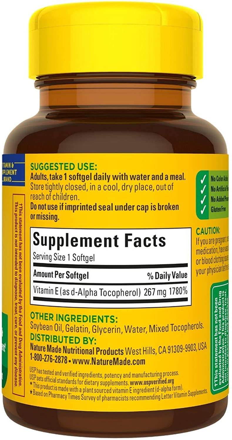 Nature Made bottle with lid off showing softgel capsules.