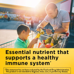 Close-up of dl-alpha vitamin E softgels on bottle side