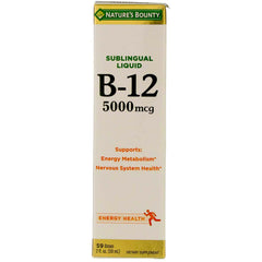 Nature's Bounty B-12 bottle closeup showing the product label for energy support