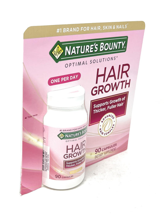 Nature's Bounty Hair Growth capsules closeup shows daily capsule form.