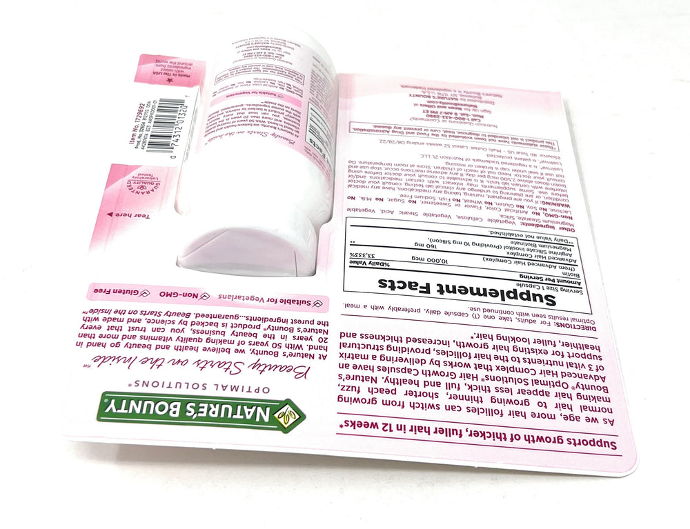 Nature's Bounty Hair Growth capsules in hand suggest easy daily use.