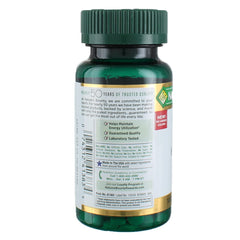 Lifestyle shot of taking Nature's Bounty iron tablets as part of daily routine.