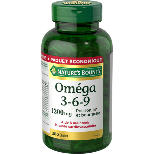 Nature's Bounty Omega-3-6-9 softgels in hand show easy daily intake.