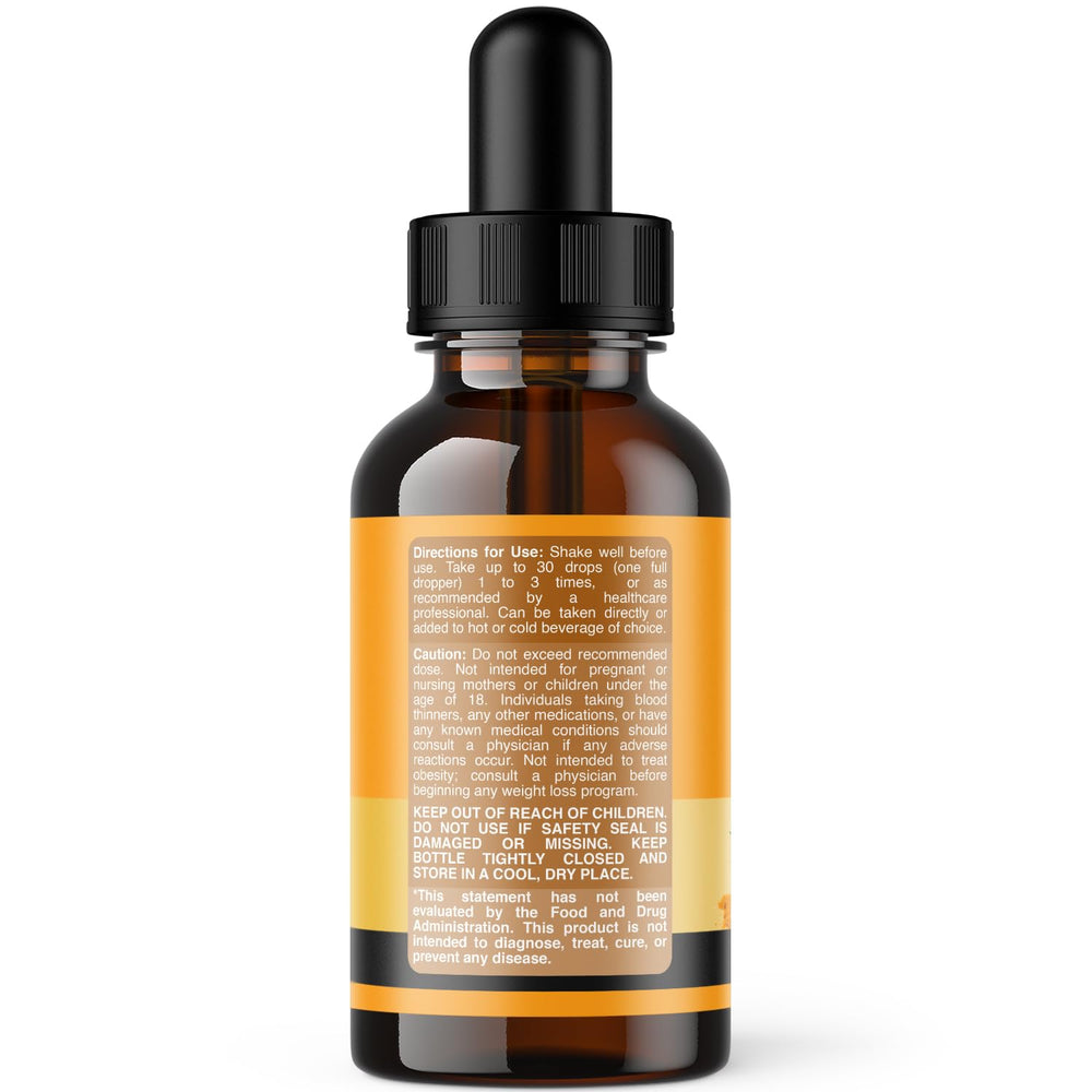 Nature's Craft Turmeric Liquid Drops dropper pouring drops into a glass.