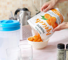 Desk-side snack setup featuring Nature's Garden probiotic apricots