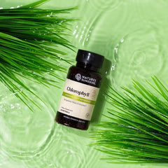 Closeup of Nature's Sunshine Chlorophyll capsules designed for easy daily use.