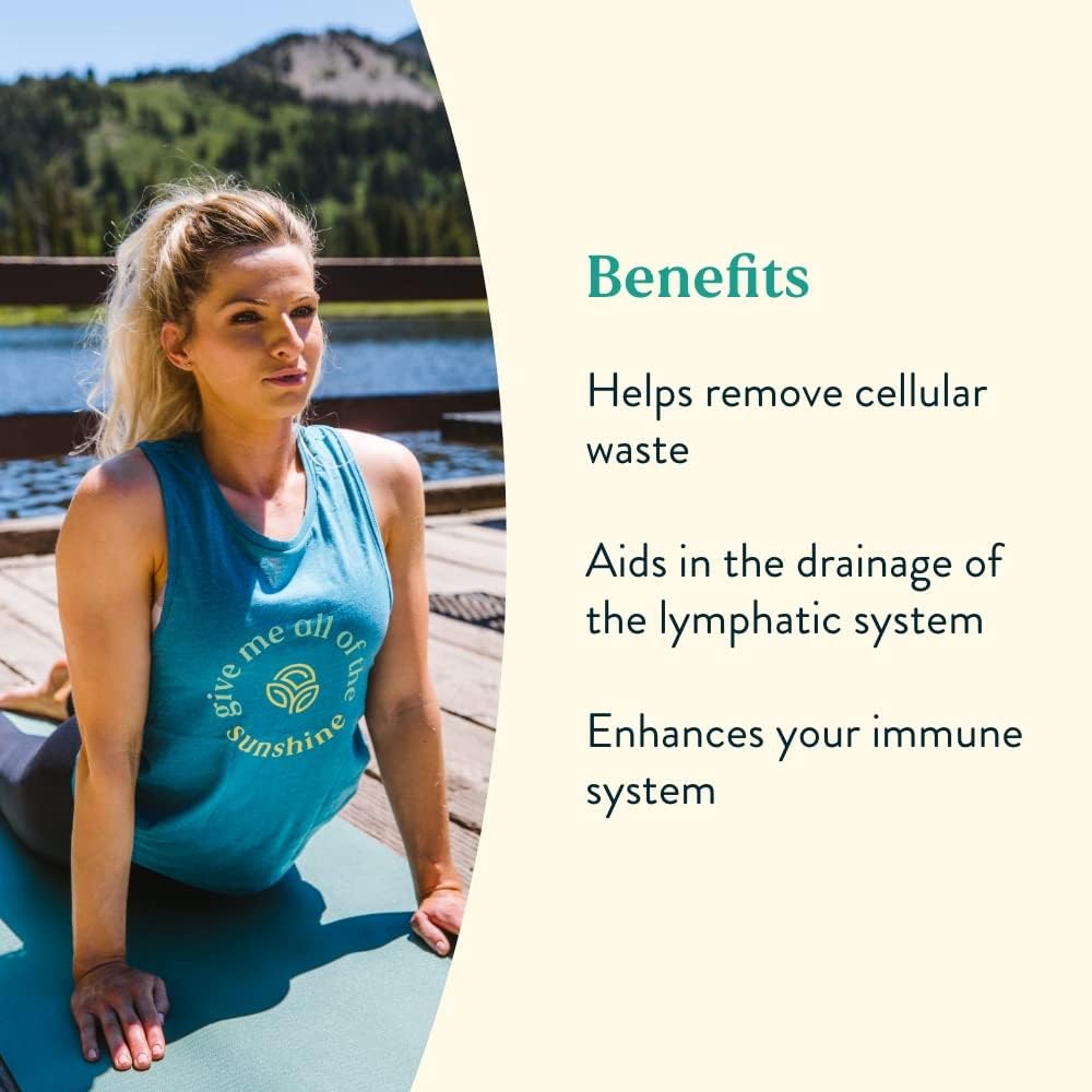 Pouring Nature's Sunshine Lymphatic Drainage Drops into water for easy use
