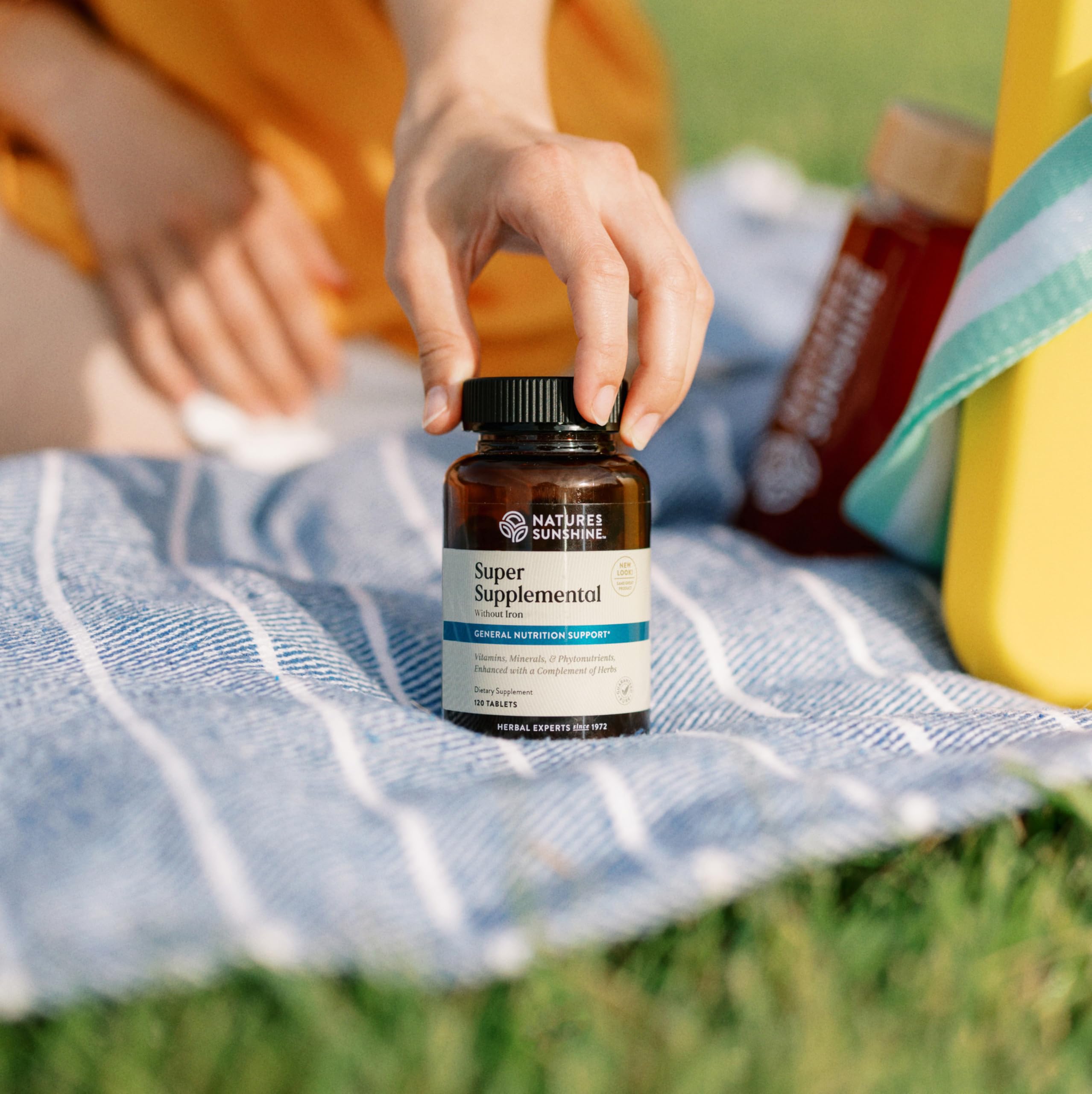 Nature's Sunshine Supersupplement tablets closeup showcases the daily multivitamin formula