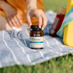 Nature's Sunshine Supersupplement tablets closeup showcases the daily multivitamin formula