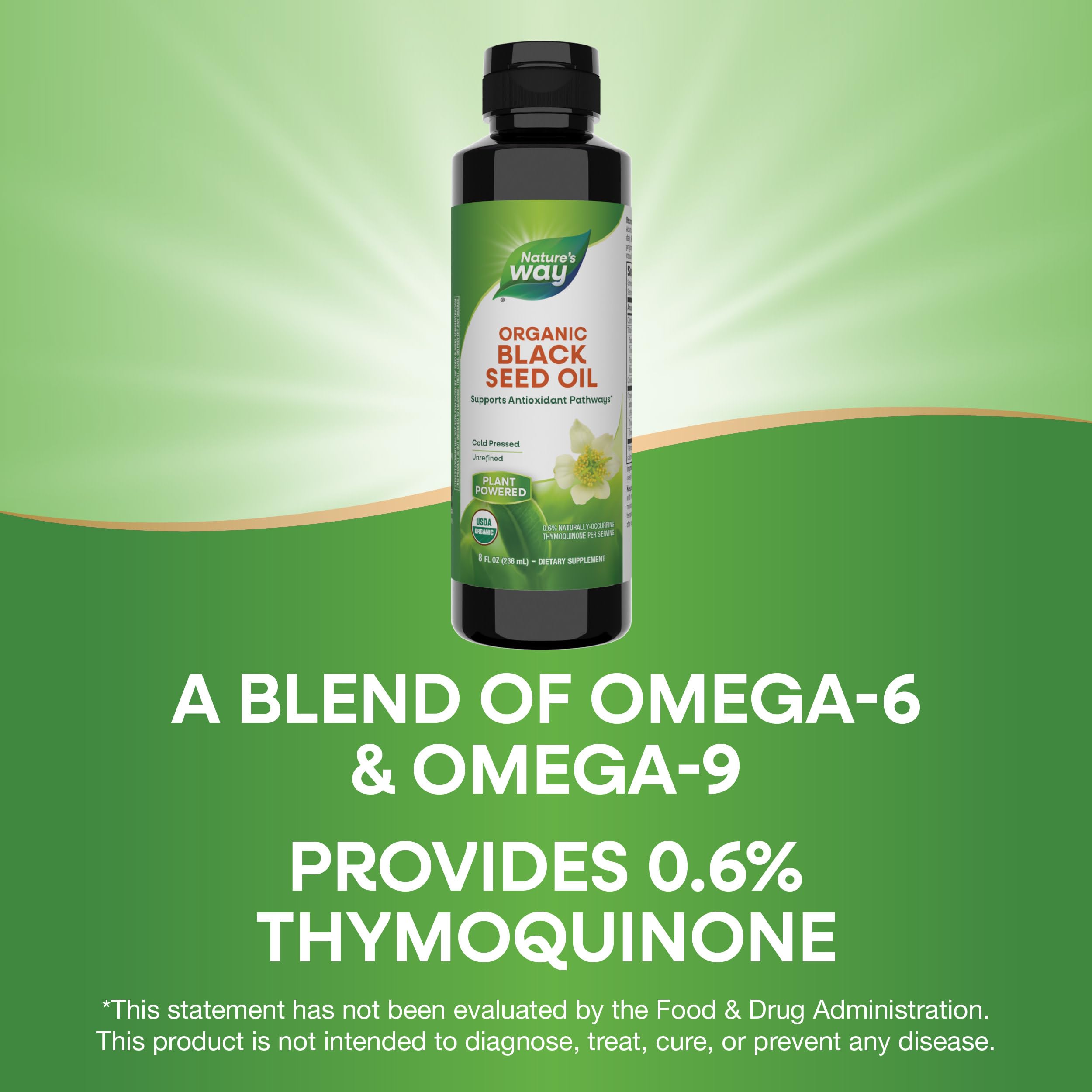 Pouring Nature's Way Black Seed Oil for easy daily usage.