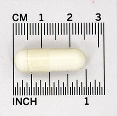 NCI Advanced Research calcium orotate capsules pictured with a dinner setting for evening meal use.