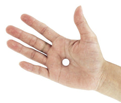 NCI Magnesium Orotate tablets on a clean countertop ideal for routine supplementation.