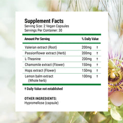 Nested Naturals Luna Melatonin-Free bottle valerian extract close-up signaling relaxation before bed.
