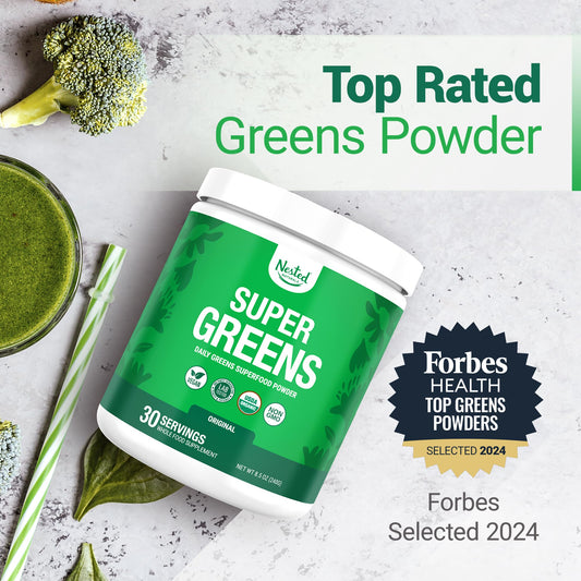 Nested Naturals Super Greens spoon pouring powder for smoothies and quick nutrition.