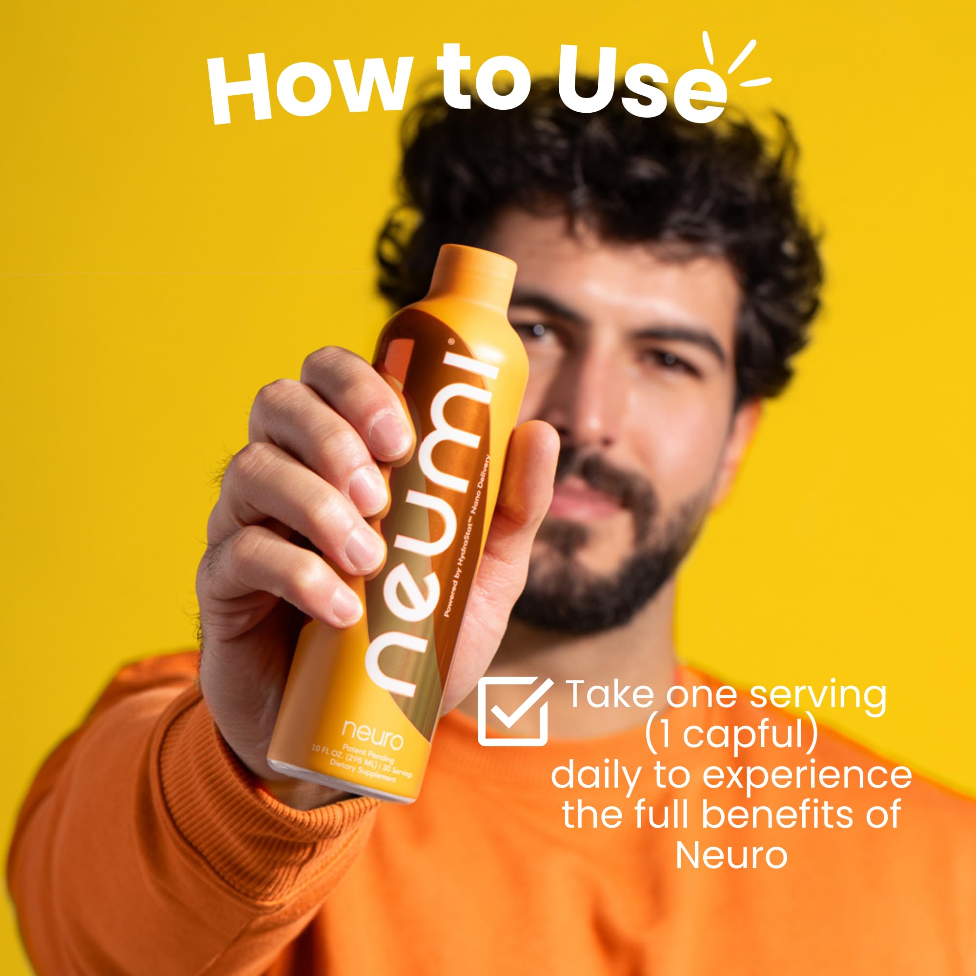Serving scoop of Neumi Neuro with glass of water for sustained focus.