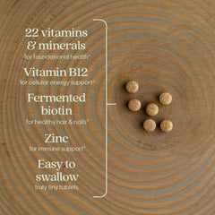 New Chapter Tiny Tabs tablets stacked to demonstrate compact size for easy swallowing.