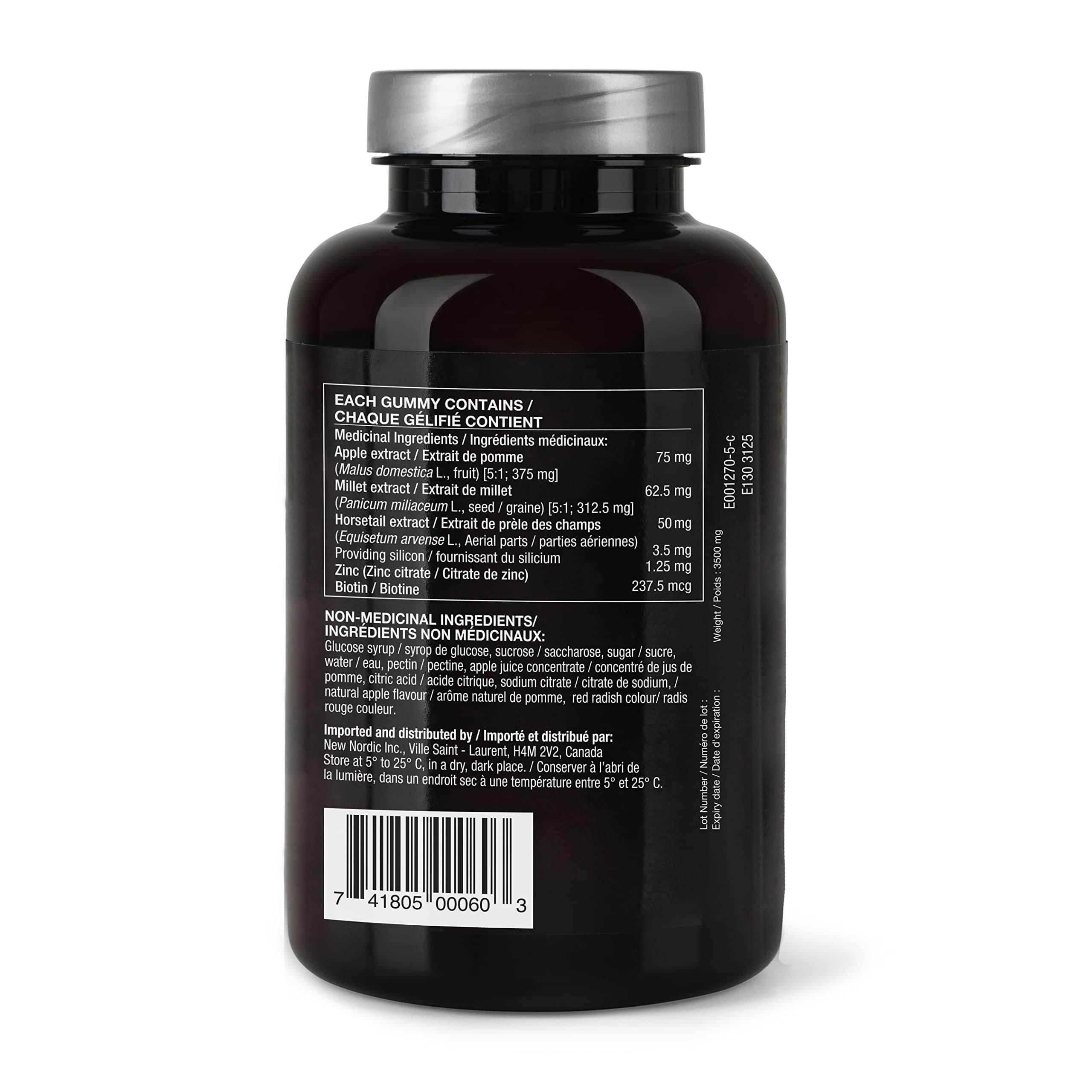 Close-up of New Nordic Hair Volume Gummies bottle showing vegan formula.