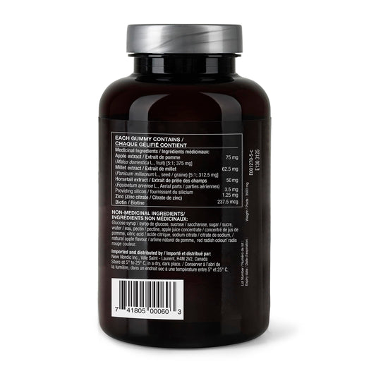 Close-up of New Nordic Hair Volume Gummies bottle showing vegan formula.