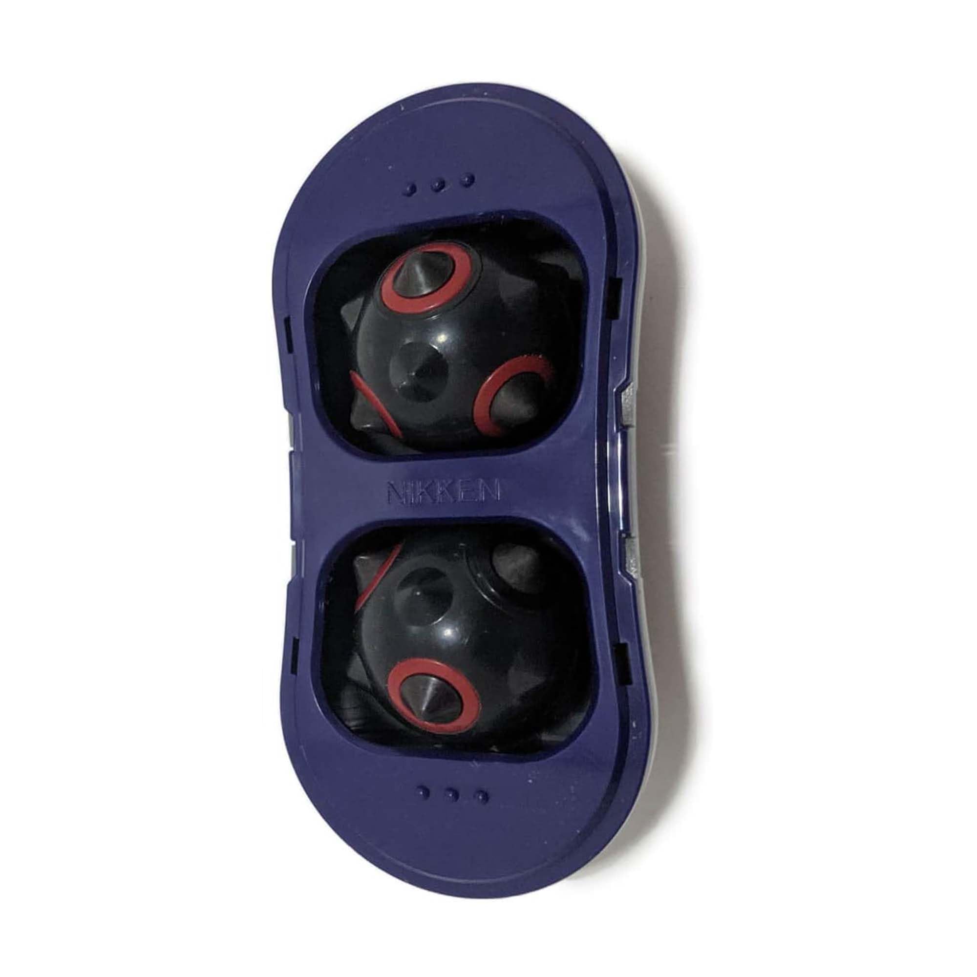 Nikken MagDuo compact massager with carrying case for portable relief.