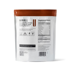 NOBULL plant protein powder scoop highlights easy mixing for training days.