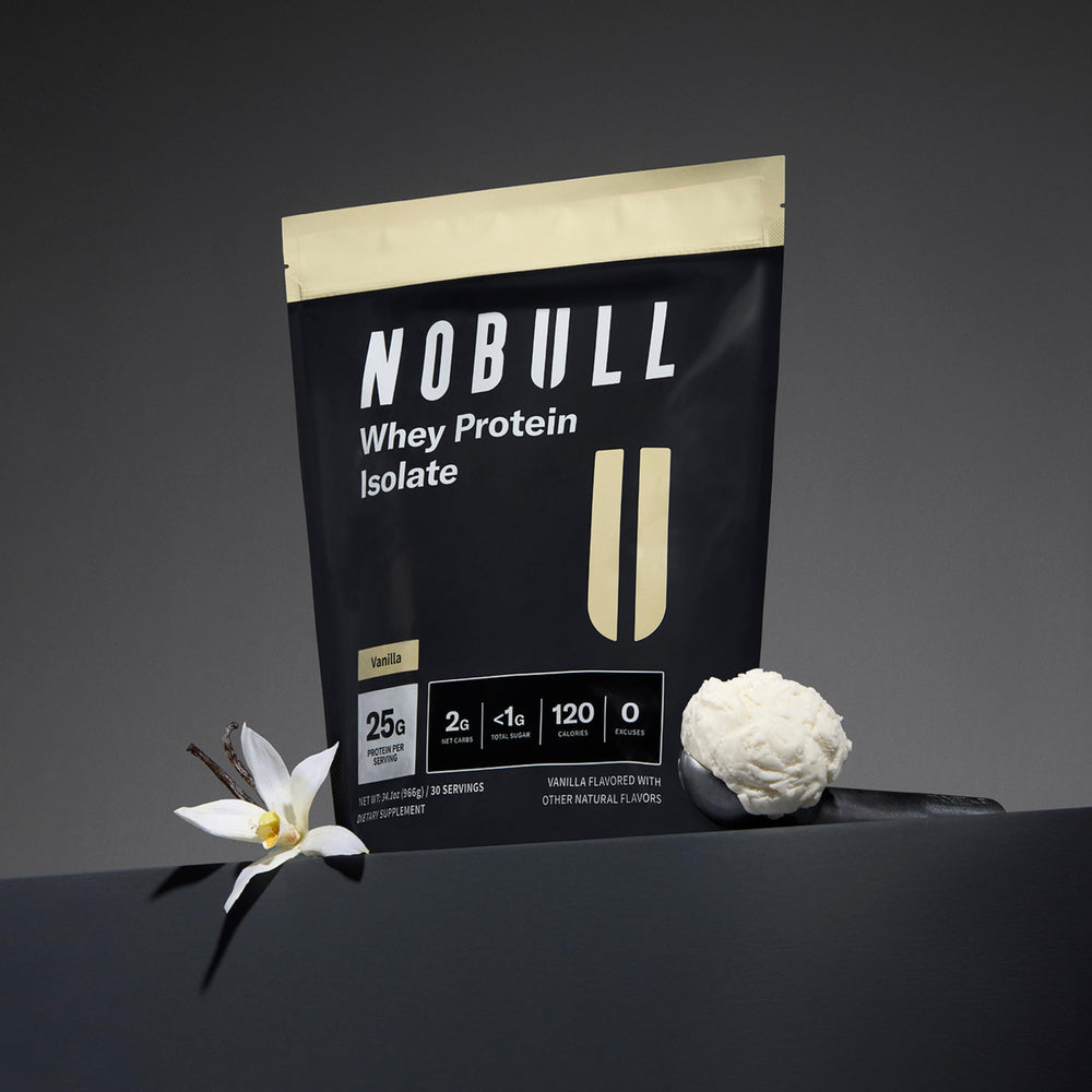 NOBULL vanilla whey protein scoop with powder ideal for workouts.