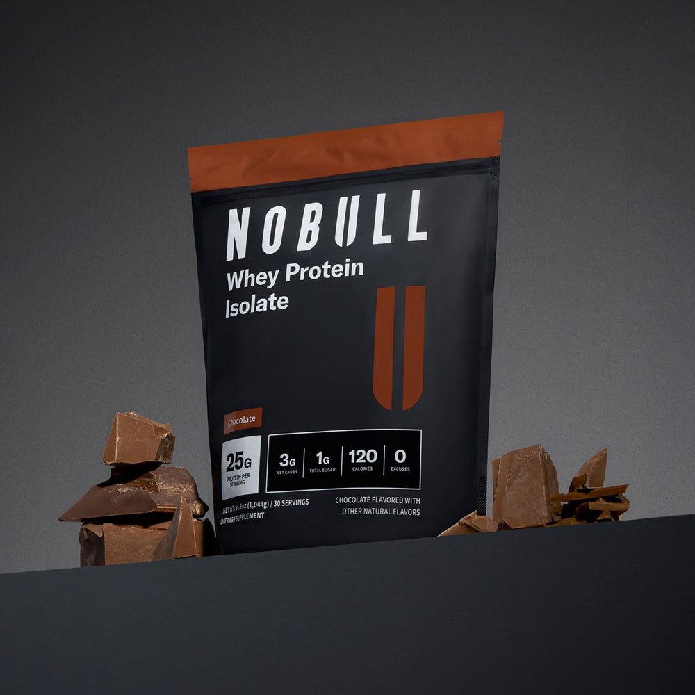 NOBULL Whey Isolate powder close-up shows smooth texture for shakes.