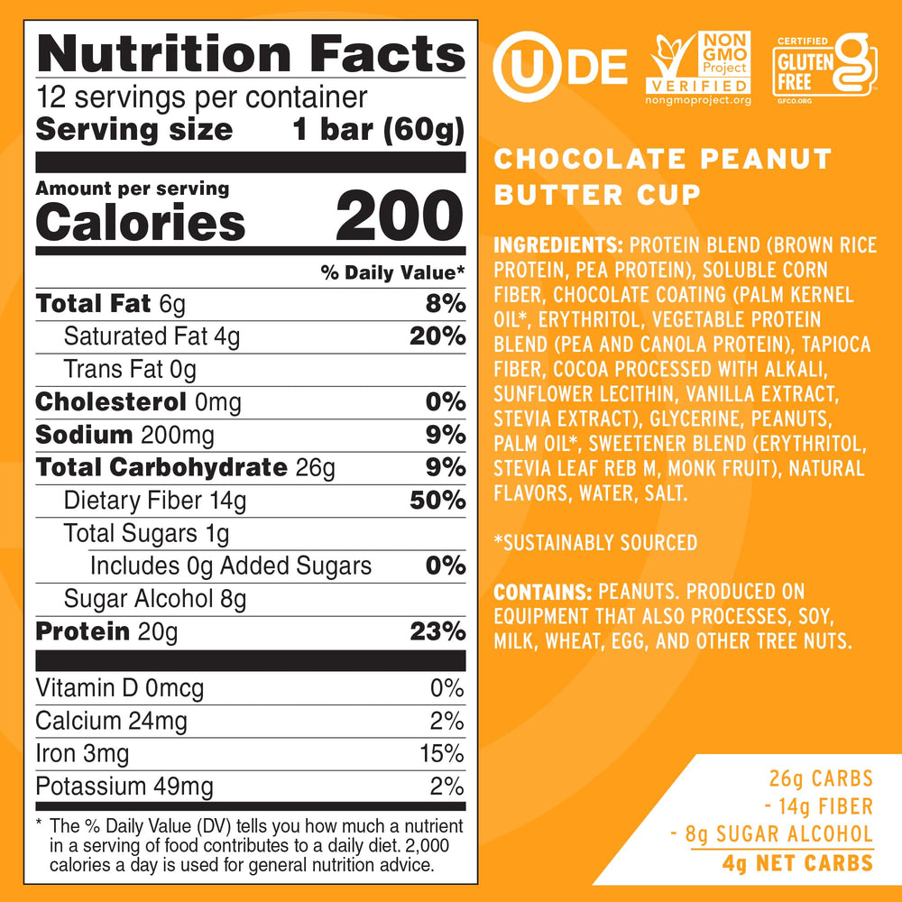 No Cow Upgraded Peanut Butter Cup bar chocolate cross-section showing creamy peanut butter and protein.