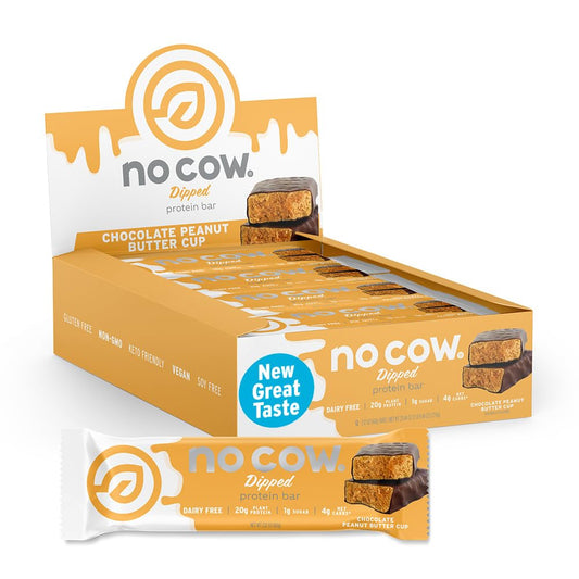 No Cow Upgraded Peanut Butter Cup bar wrapper close-up highlighting premium texture and snack appeal.