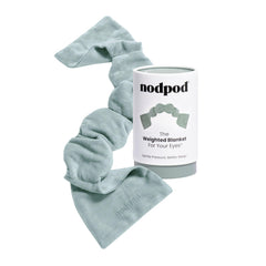 Nodpod gentle pressure sleep mask worn on face delivering soothing relaxation.