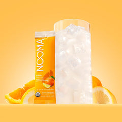 NOOMA hydrating electrolyte mix citrus packet closeup, showcasing USDA Organic ingredients.