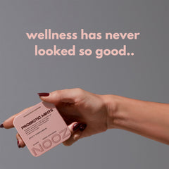 NOOZ Probiotic Mints spicy cinnamon dispensing to show flavor freshness for daily use.