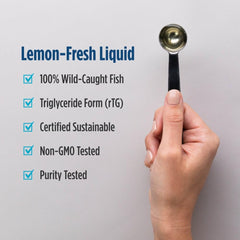Nordic Naturals Ultimate Omega Liquid lemon bottle on kitchen counter.