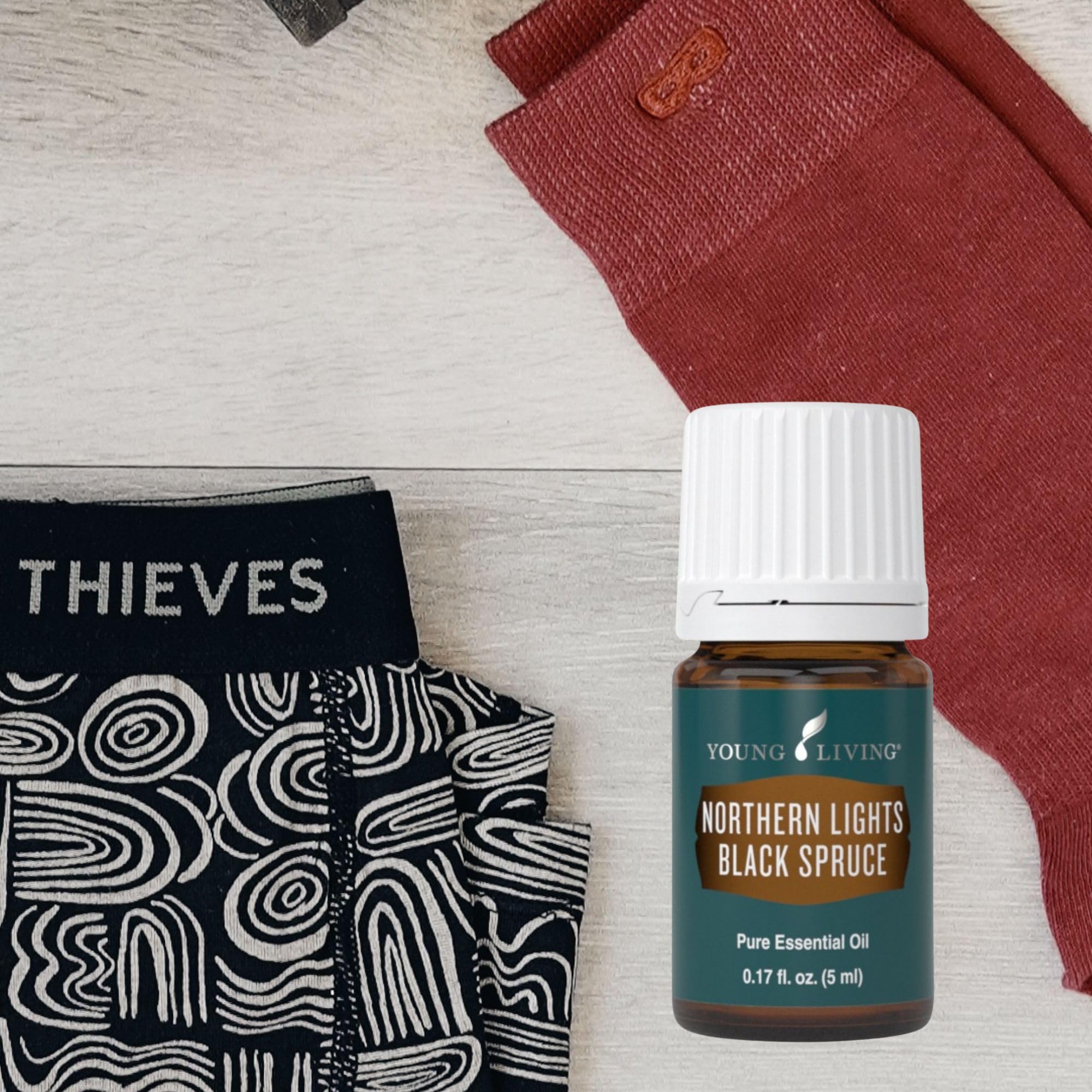 Young Living Northern Black Spruce for hair care and shine.