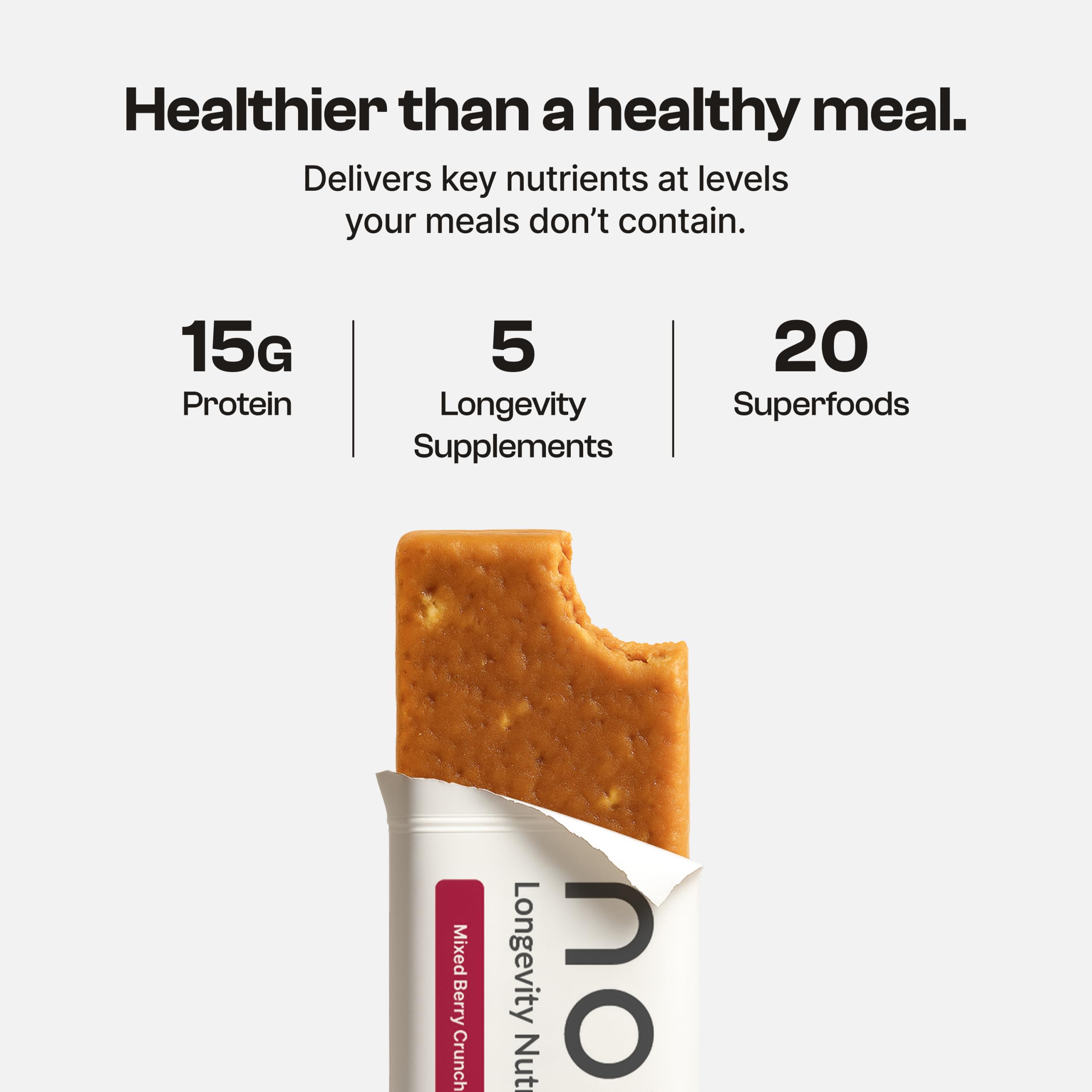 Novos Longevity Bar Mixed Berry Crunch unwrapped, ready for on-the-go nourishment.