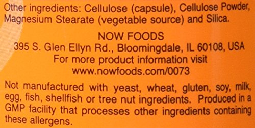 NOW Foods L-Carnitine 500 mg capsules being poured, showcasing vegan capsules.