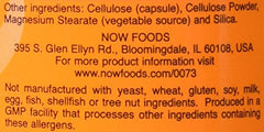 NOW Foods L-Carnitine 500 mg capsules being poured, showcasing vegan capsules.