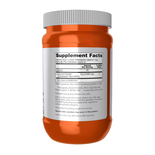NOW Foods Leucine Powder scoop pouring into shaker for easy mixing