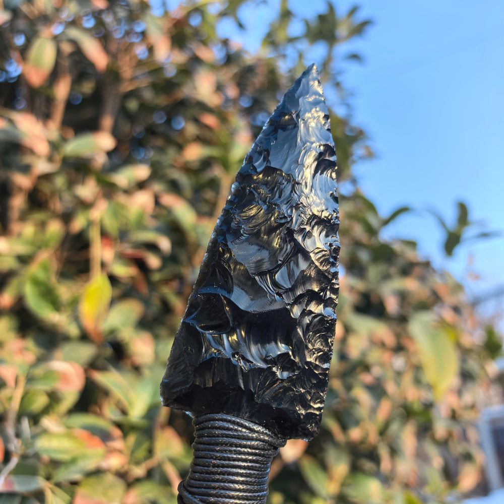 NsmjodStone arrowhead knife shows 9-inch length for versatile display