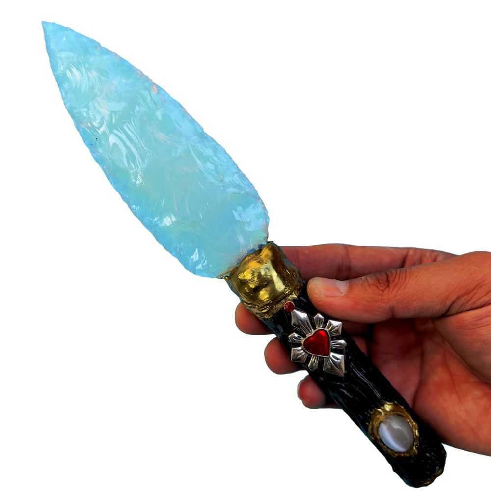 NsmjodStone crystal knife arrowhead showing focused energy for meditation rituals.