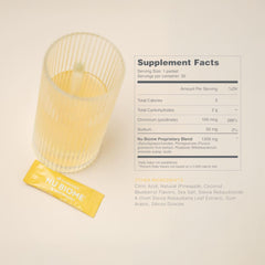 Nu Skin Nu Biome morning routine image showing quick mix with water for balance