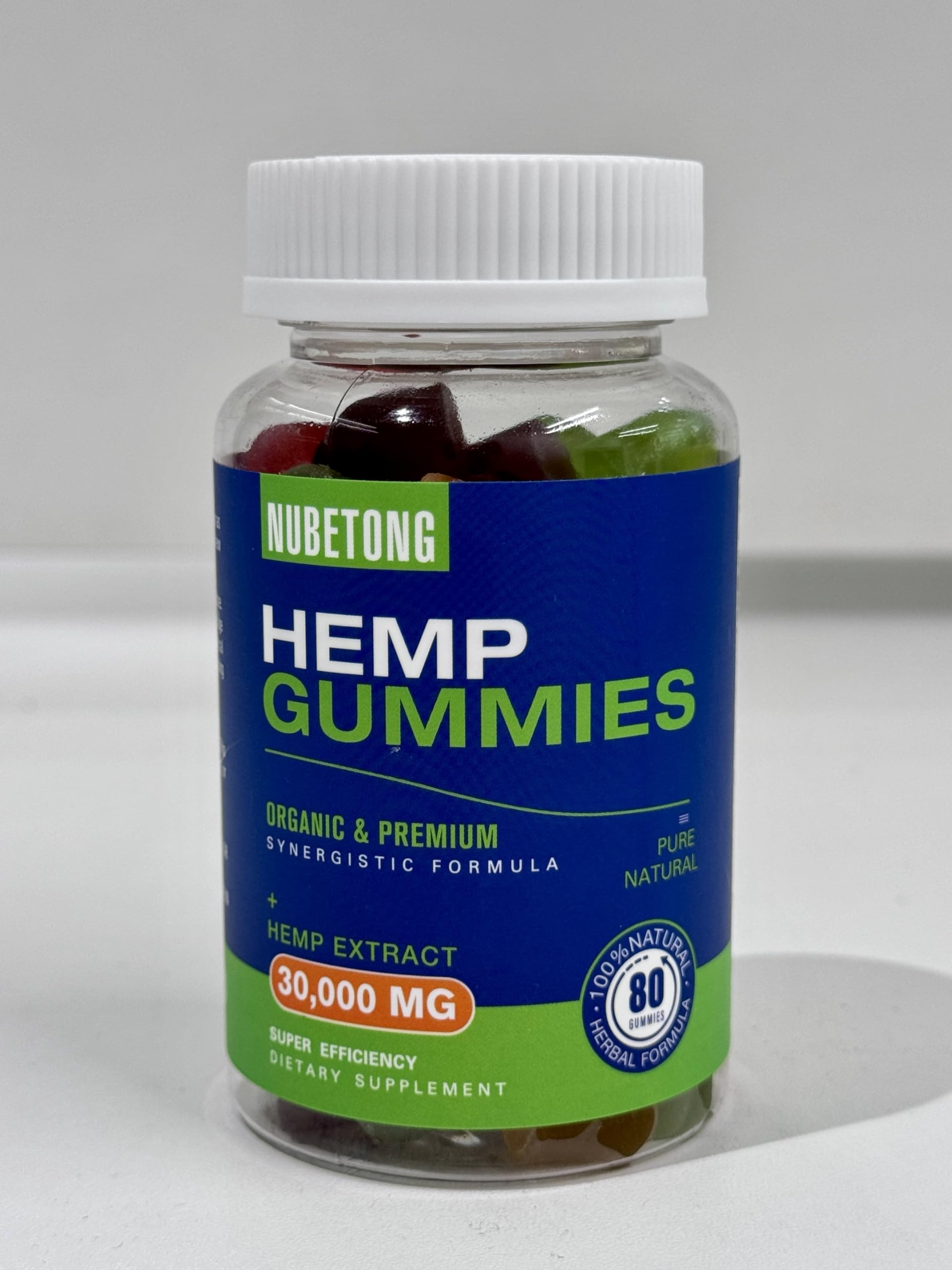 Nubetong hemp gummies bottle pour showing convenient dosage for on-the-go use.