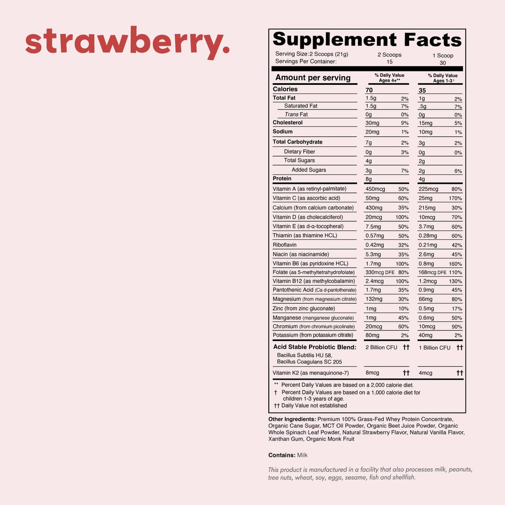 Scoop beside Nurished Mighty Strawberry Milk shows easy, measured servings.